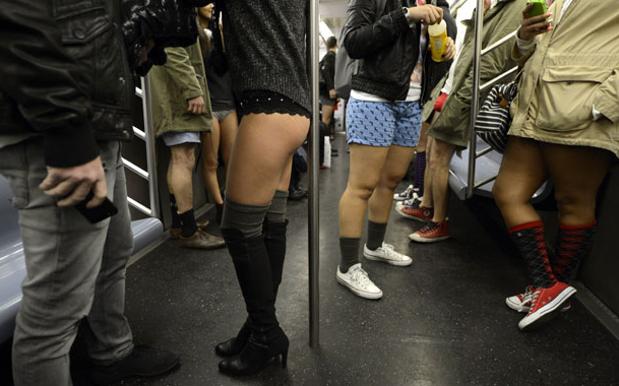 No pants subway ride 2014: Commuters drop their pants across the