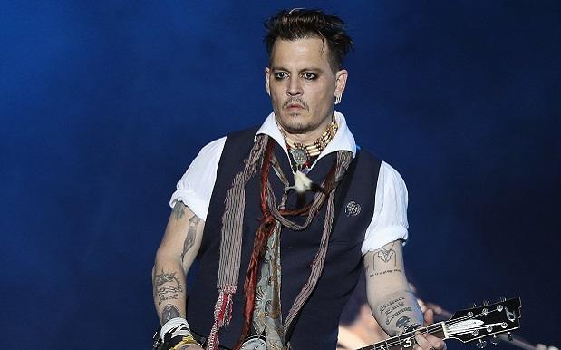 Johnny Depps SLIM to SCUM Tattoo Edit May Be a Dig at Amber Heard  PopStarTats