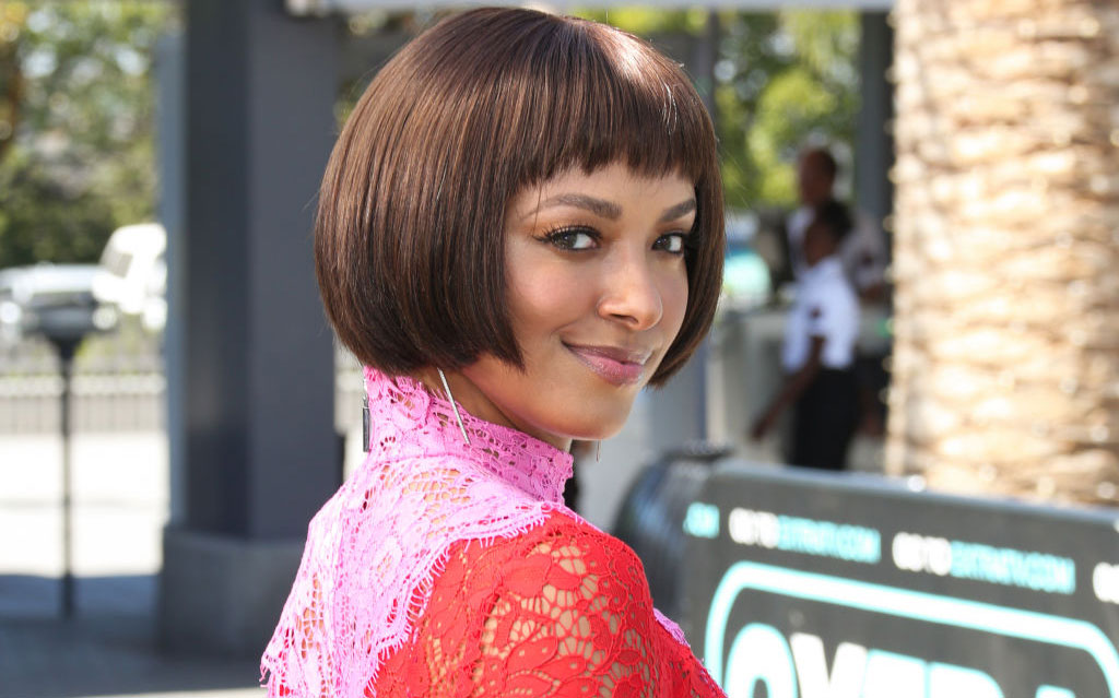 Kat Graham Curly Black Side Part Hairstyle | Steal Her Style