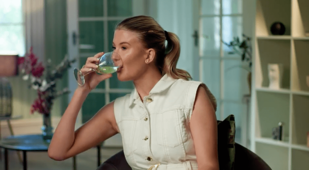 Lauren from Married At First Sight Australia drinking wine