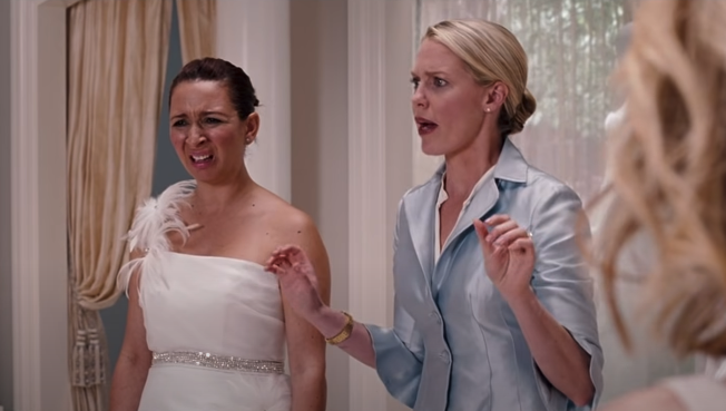 Bridesmaid scene with the wedding planner looking shocked