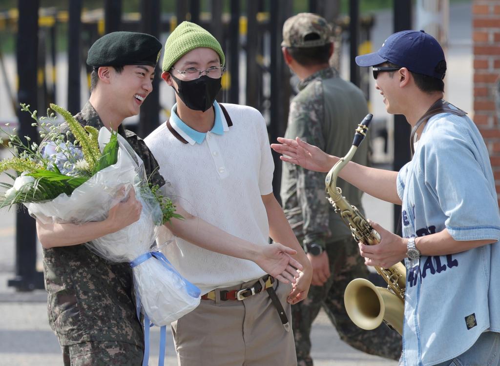 BTS Jin being discharged from military and RM with a saxophone